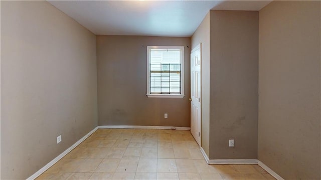 1336 Sere St, New Orleans, LA 70122 - unfurnished room with baseboards and light tile patterned floors