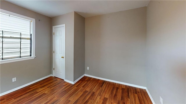 1336 Sere St, New Orleans, LA 70122 - unfurnished room with baseboards and wood finished floors
