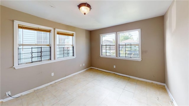 1336 Sere St, New Orleans, LA 70122 - spare room with baseboards