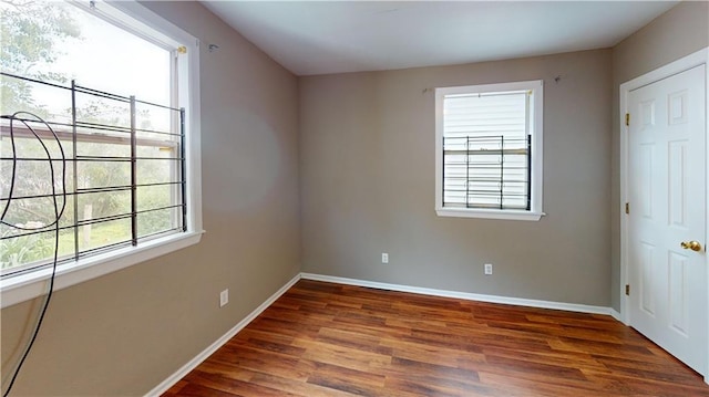 1336 Sere St, New Orleans, LA 70122 - unfurnished bedroom featuring baseboards and wood finished floors