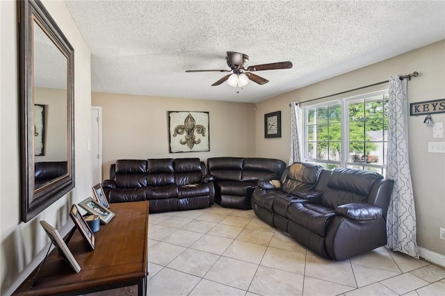 2967 Camellia Dr, Slidell, LA 70458 - living area featuring light tile patterned floors, a ceiling fan, and a textured ceiling