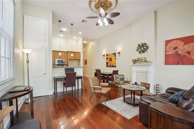 192426 Esplanade Ave, New Orleans, LA 70116 - living area featuring a ceiling fan, visible vents, and dark wood-type flooring