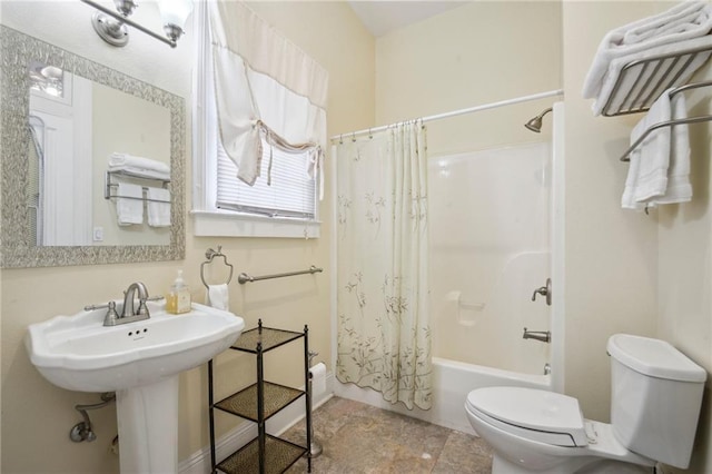 192426 Esplanade Ave, New Orleans, LA 70116 - bathroom with toilet and shower / bath combination with curtain