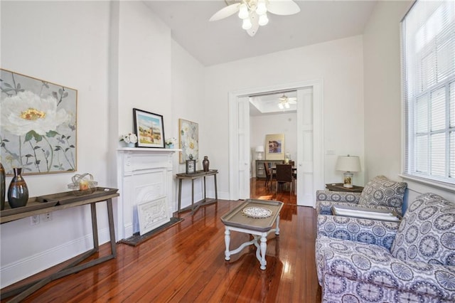 192426 Esplanade Ave, New Orleans, LA 70116 - living area featuring baseboards, ceiling fan, and wood finished floors
