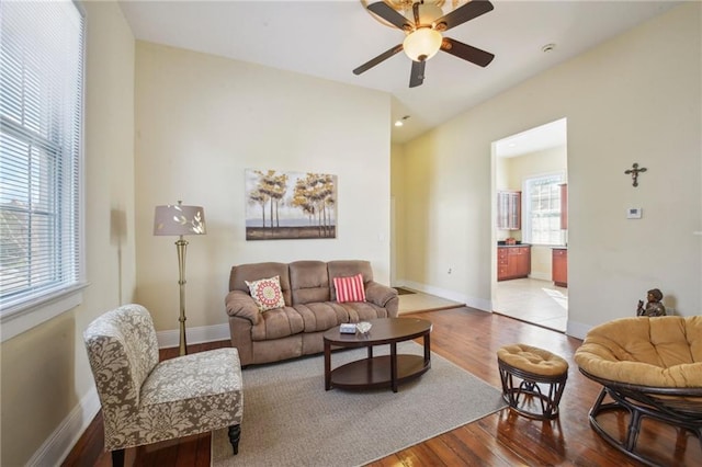 192426 Esplanade Ave, New Orleans, LA 70116 - living area featuring baseboards, ceiling fan, and wood finished floors