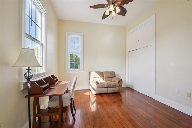 192426 Esplanade Ave, New Orleans, LA 70116 - living area with baseboards, dark wood finished floors, and ceiling fan