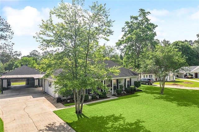 view of front facade with driveway, a front lawn, and a carport