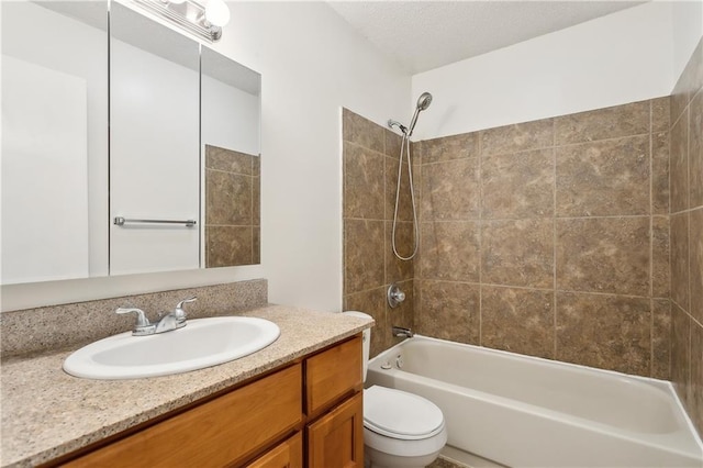bathroom featuring shower / bathtub combination, vanity, and toilet