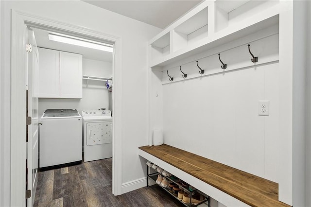 mudroom with separate washer and dryer, baseboards, and dark wood-type flooring