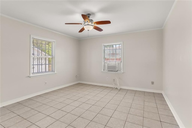 unfurnished room featuring plenty of natural light, ornamental molding, and ceiling fan