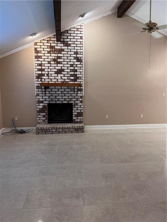 unfurnished living room with vaulted ceiling with beams, a brick fireplace, ceiling fan, and baseboards