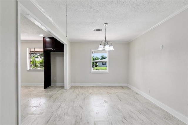 unfurnished dining area featuring crown molding, a notable chandelier, a textured ceiling, and visible vents