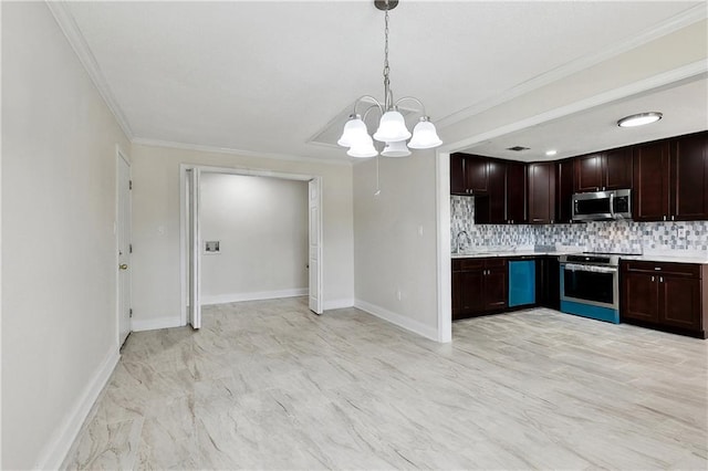 kitchen featuring ornamental molding, light countertops, a sink, a notable chandelier, and stainless steel appliances