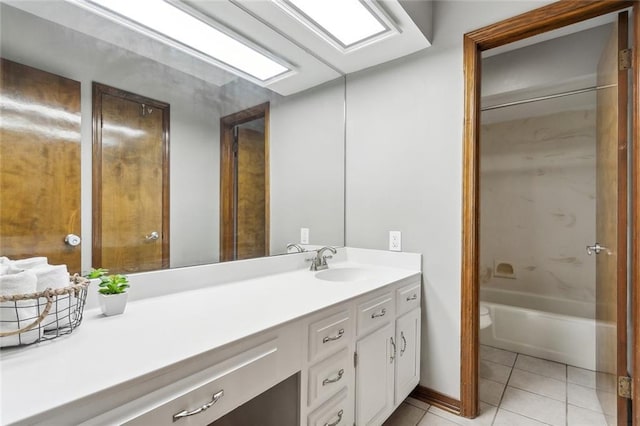 bathroom with tile patterned floors, vanity, and tub / shower combination