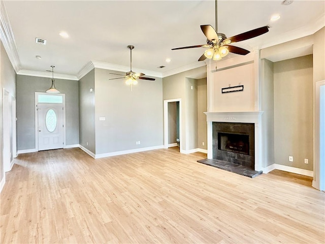 204 Doerr Dr, Arabi, LA 70032 - unfurnished living room with a ceiling fan, light wood-type flooring, baseboards, ornamental molding, and a fireplace