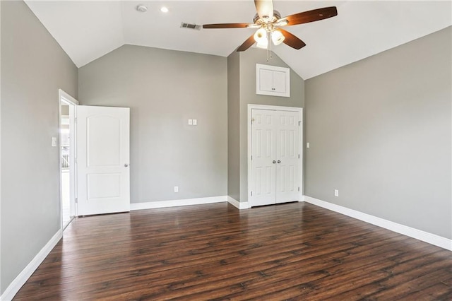 204 Doerr Dr, Arabi, LA 70032 - empty room with a ceiling fan, dark wood-style flooring, baseboards, and high vaulted ceiling