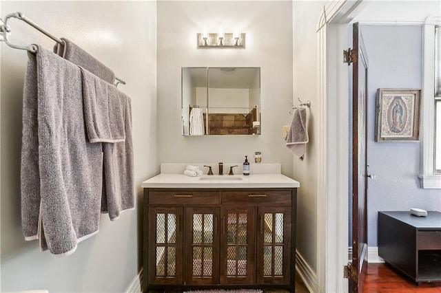 1818 Paul Morphy St, New Orleans, LA 70119 - bathroom with vanity and baseboards