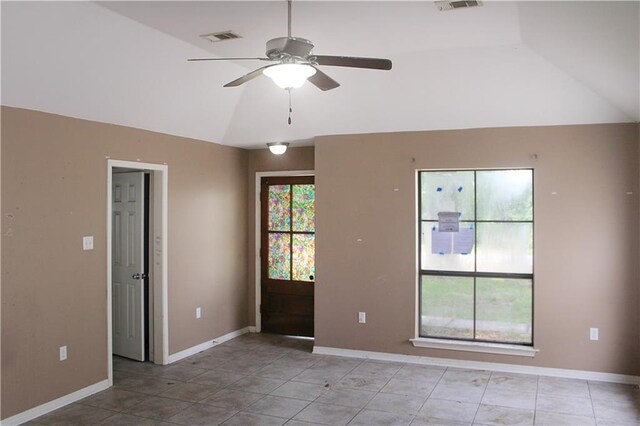 57288 Beech Ave, Slidell, LA 70461 - unfurnished room with a ceiling fan, visible vents, baseboards, tile patterned floors, and lofted ceiling