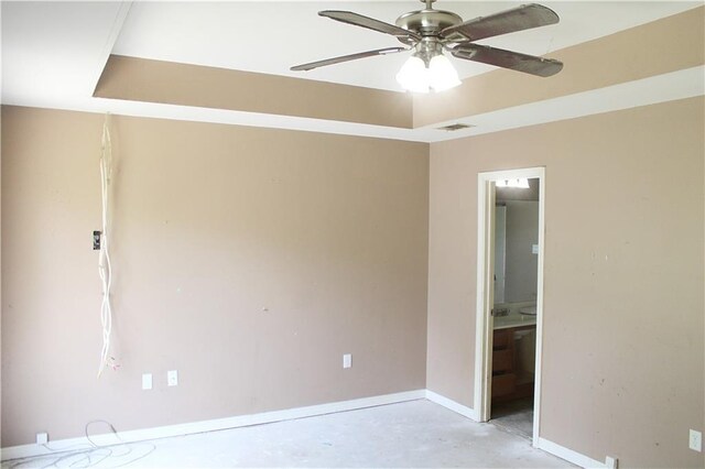 57288 Beech Ave, Slidell, LA 70461 - spare room featuring concrete flooring, ceiling fan, visible vents, and baseboards