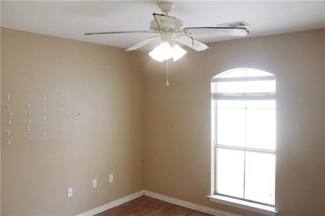 57288 Beech Ave, Slidell, LA 70461 - unfurnished room featuring baseboards, ceiling fan, wood finished floors, and visible vents