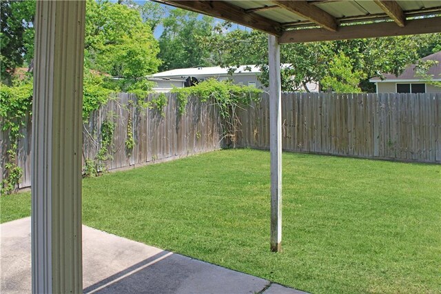 57288 Beech Ave, Slidell, LA 70461 - view of yard with a fenced backyard and a patio area