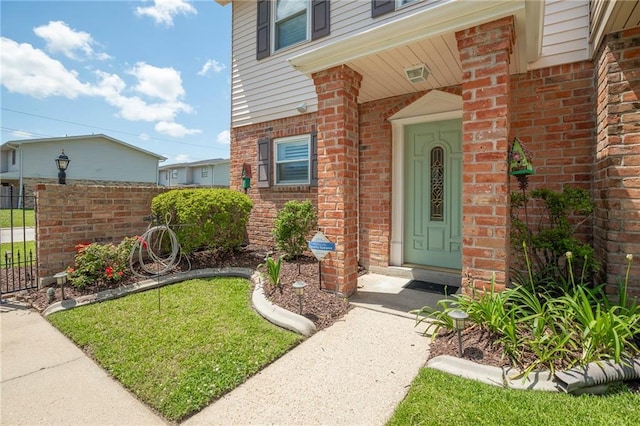 25 Brandon Hall Dr Unit A, Destrehan, LA 70047 - doorway to property with brick siding and fence