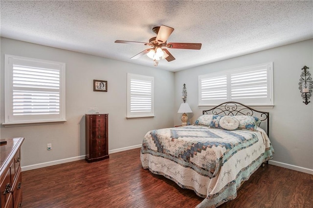 25 Brandon Hall Dr Unit A, Destrehan, LA 70047 - bedroom with baseboards, a ceiling fan, dark wood-style flooring, and a textured ceiling