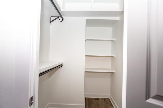 271719 Clover St, New Orleans, LA 70122 - walk in closet featuring dark wood finished floors