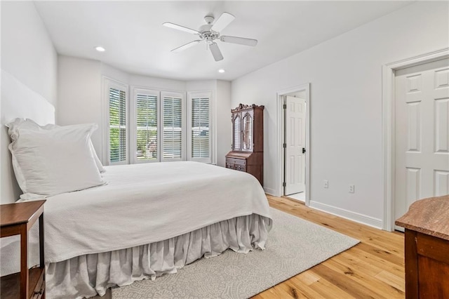 34 Riverdale Dr, Covington, LA 70433 - bedroom with light wood-style flooring, baseboards, recessed lighting, and ceiling fan