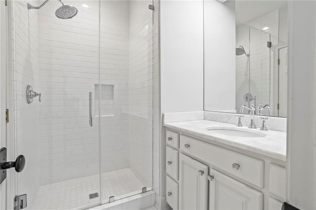 34 Riverdale Dr, Covington, LA 70433 - bathroom featuring a shower stall and vanity
