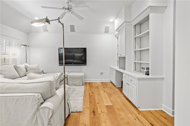 34 Riverdale Dr, Covington, LA 70433 - living room featuring a ceiling fan, light wood-style floors, baseboards, and recessed lighting