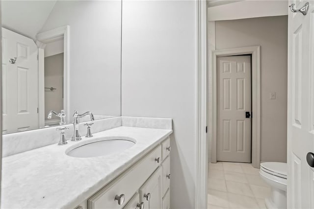 34 Riverdale Dr, Covington, LA 70433 - bathroom featuring toilet, tile patterned floors, and vanity