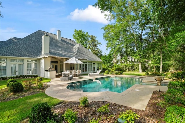 34 Riverdale Dr, Covington, LA 70433 - outdoor pool featuring french doors and a patio