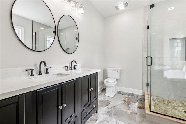 bathroom with visible vents, a sink, a stall shower, and toilet