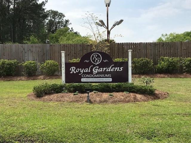 47 Birdie Dr Unit 7, Slidell, LA 70460 - community sign with a yard and fence