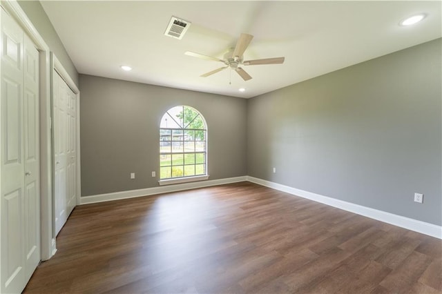 125 Vaccaro St, Independence, LA 70443 - unfurnished bedroom featuring baseboards, recessed lighting, visible vents, and dark wood-type flooring
