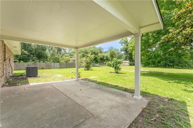 125 Vaccaro St, Independence, LA 70443 - view of patio featuring central AC and fence