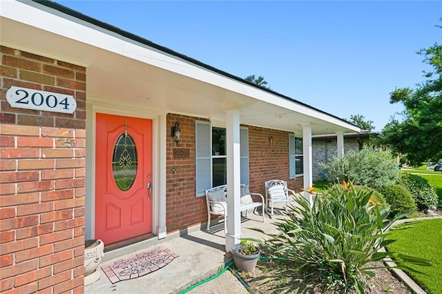 2004 Harvard Ave, Metairie, LA 70001 - doorway to property with a porch and brick siding