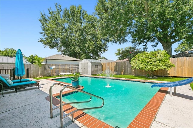 2004 Harvard Ave, Metairie, LA 70001 - view of swimming pool with a water slide, a fenced backyard, and a patio area