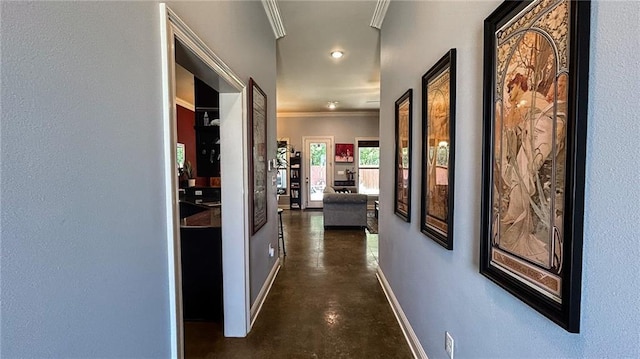 47135 Vineyard Trce, Hammond, LA 70401 - hallway with finished concrete flooring, baseboards, and crown molding