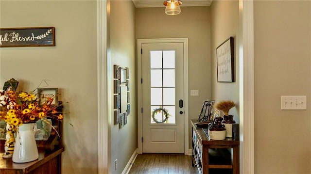 318 Saw Grass Loop, Covington, LA 70435 - doorway to outside with crown molding, wood finished floors, and baseboards
