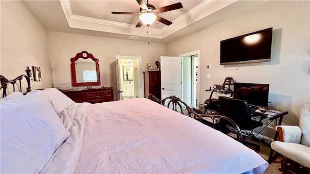 318 Saw Grass Loop, Covington, LA 70435 - bedroom featuring crown molding, a raised ceiling, ensuite bath, and ceiling fan