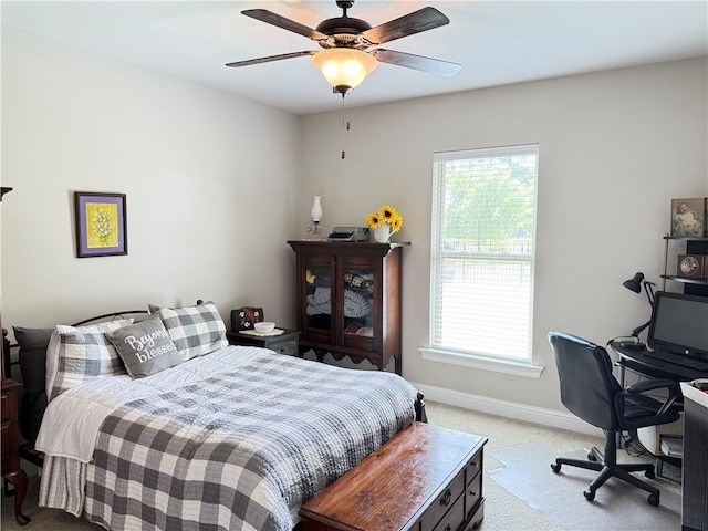 318 Saw Grass Loop, Covington, LA 70435 - bedroom with light colored carpet, baseboards, an office area, and ceiling fan