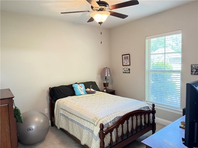 318 Saw Grass Loop, Covington, LA 70435 - carpeted bedroom with baseboards and a ceiling fan