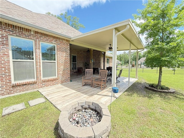 318 Saw Grass Loop, Covington, LA 70435 - view of patio with a ceiling fan and a fire pit