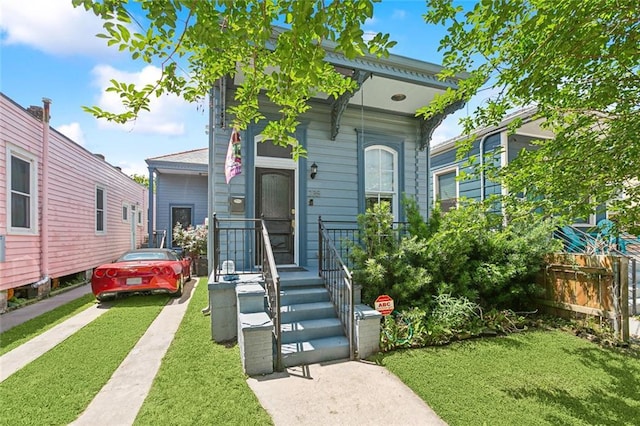 235 Belleville St, New Orleans, LA 70114 - shotgun-style home with a front lawn