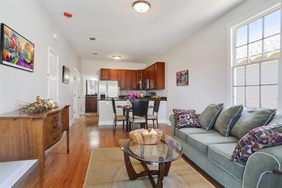 living area featuring light wood-style flooring