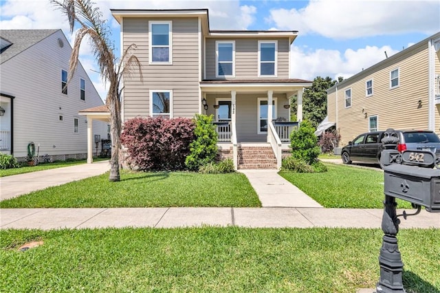 542 Abalon Ct, New Orleans, LA 70114 - view of front of property with a porch, a front yard, and concrete driveway