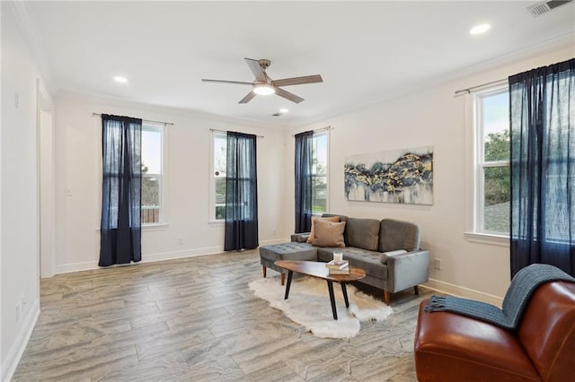 living area featuring baseboards, ceiling fan, recessed lighting, and visible vents