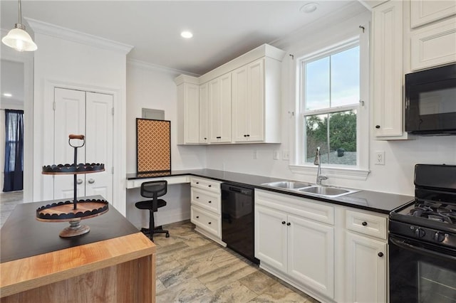 kitchen with crown molding, a sink, white cabinets, black appliances, and wood counters